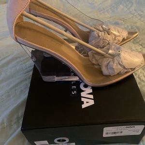 Clear/Nude Brand new wedge heels. Perfect for any occasion. Brand new!